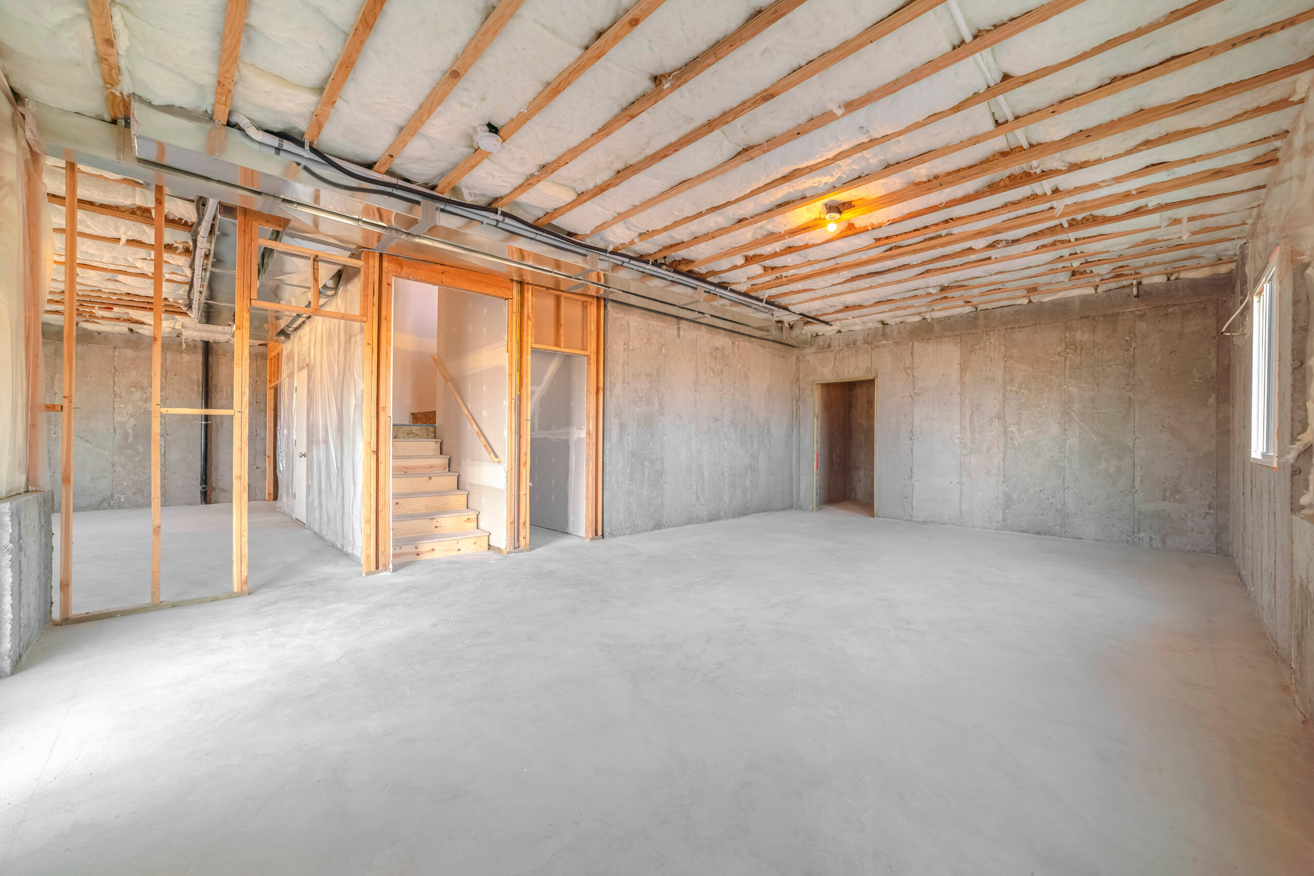 Interior of new home room under construction Interior of new home room under construction. The interior of a new home room under construction showing studs and insulation.
